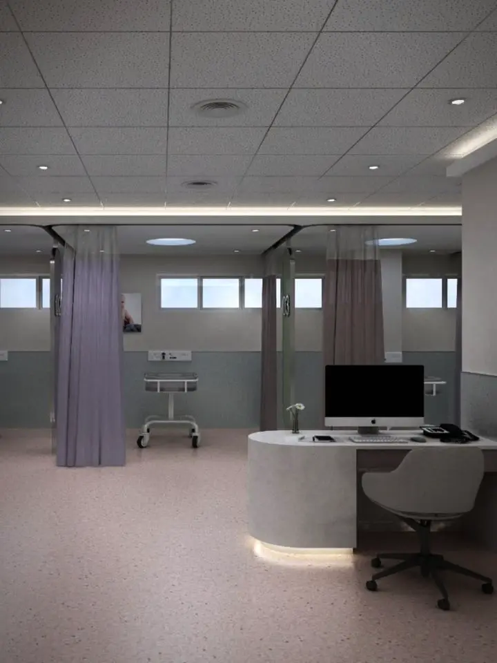 Render detail of a calm neonatal care area: a curved nurse’s desk with a computer, in front of a crib and curtained bays beneath high windows.